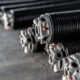 How Long Do Overhead Door Springs Last When Your Business Opens Them All Day